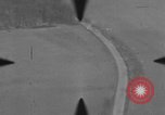 Image of P-47 of U.S. 404th squadron strafing European Theater, 1945, second 54 stock footage video 65675045658