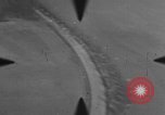 Image of P-47 of U.S. 404th squadron strafing European Theater, 1945, second 56 stock footage video 65675045658