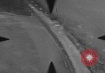 Image of P-47 of U.S. 404th squadron strafing European Theater, 1945, second 58 stock footage video 65675045658