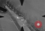 Image of P-47 of U.S. 404th squadron strafing European Theater, 1945, second 59 stock footage video 65675045658