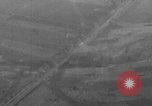 Image of P-47 piloted by Lt Johnson strafes roads European Theater, 1945, second 30 stock footage video 65675045659