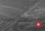Image of P-47 piloted by Lt Johnson strafes roads European Theater, 1945, second 32 stock footage video 65675045659