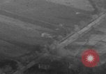Image of P-47 piloted by Lt Johnson strafes roads European Theater, 1945, second 36 stock footage video 65675045659