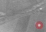 Image of P-47 piloted by Lt Johnson strafes roads European Theater, 1945, second 46 stock footage video 65675045659