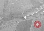Image of P-47 piloted by Lt Johnson strafes roads European Theater, 1945, second 48 stock footage video 65675045659