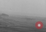 Image of P-47 piloted by Lt Johnson strafes roads European Theater, 1945, second 54 stock footage video 65675045659