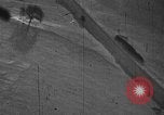 Image of gun camera footage P-47 snowy terrain European Theater, 1945, second 17 stock footage video 65675045662