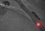 Image of gun camera footage P-47 snowy terrain European Theater, 1945, second 18 stock footage video 65675045662