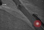 Image of gun camera footage P-47 snowy terrain European Theater, 1945, second 20 stock footage video 65675045662
