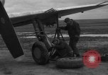 Image of Mechanics performing maintenance on P-47s Chievres Belgium, 1944, second 3 stock footage video 65675045686