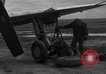 Image of Mechanics performing maintenance on P-47s Chievres Belgium, 1944, second 4 stock footage video 65675045686