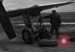 Image of Mechanics performing maintenance on P-47s Chievres Belgium, 1944, second 5 stock footage video 65675045686