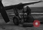 Image of Mechanics performing maintenance on P-47s Chievres Belgium, 1944, second 9 stock footage video 65675045686