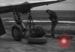 Image of Mechanics performing maintenance on P-47s Chievres Belgium, 1944, second 12 stock footage video 65675045686