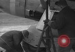 Image of Mechanics performing maintenance on P-47s Chievres Belgium, 1944, second 14 stock footage video 65675045686