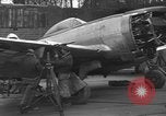 Image of Mechanics performing maintenance on P-47s Chievres Belgium, 1944, second 56 stock footage video 65675045686