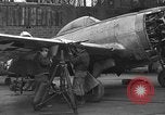 Image of Mechanics performing maintenance on P-47s Chievres Belgium, 1944, second 58 stock footage video 65675045686