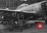 Image of Mechanics performing maintenance on P-47s Chievres Belgium, 1944, second 59 stock footage video 65675045686