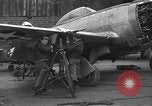 Image of Mechanics performing maintenance on P-47s Chievres Belgium, 1944, second 62 stock footage video 65675045686
