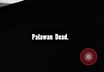 Image of Palawan Massacre prisoners bodies recovered Palawan Philippines, 1945, second 1 stock footage video 65675045828