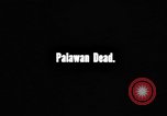 Image of Palawan Massacre prisoners bodies recovered Palawan Philippines, 1945, second 5 stock footage video 65675045828