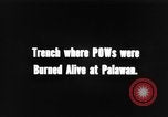Standbild Palawan Massaker Opfer geborgen Palawan Philippinen, 1945, aus Sekunde 6 historischem Filmmaterial Videoclip 65675045829
