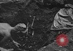 Standbild Palawan Massaker Opfer geborgen Palawan Philippinen, 1945, aus Sekunde 30 historischem Filmmaterial Videoclip 65675045829