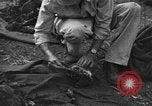Standbild Palawan Massaker Opfer geborgen Palawan Philippinen, 1945, aus Sekunde 54 historischem Filmmaterial Videoclip 65675045829
