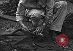 Standbild Palawan Massaker Opfer geborgen Palawan Philippinen, 1945, aus Sekunde 57 historischem Filmmaterial Videoclip 65675045829