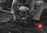 Standbild Palawan Massaker Opfer geborgen Palawan Philippinen, 1945, aus Sekunde 58 historischem Filmmaterial Videoclip 65675045829
