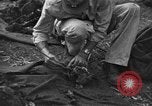 Standbild Palawan Massaker Opfer geborgen Palawan Philippinen, 1945, aus Sekunde 62 historischem Filmmaterial Videoclip 65675045829