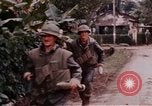 Image of United States troopers Hue Vietnam, 1968, second 28 stock footage video 65675045888