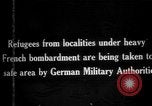 Image German military aider des réfugiés en provenance de zones de lourds bombardements Français Front Ouest, 1915, de la seconde 1 séquences d'archives historiques vidéo 65675045933