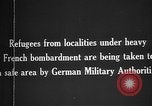 Image German military aider des réfugiés en provenance de zones de lourds bombardements Français Front Ouest, 1915, de la seconde 4 séquences d'archives historiques vidéo 65675045933