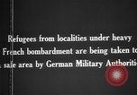 Image German military aider des réfugiés en provenance de zones de lourds bombardements Français Front Ouest, 1915, de la seconde 5 séquences d'archives historiques vidéo 65675045933