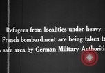 Image German military aider des réfugiés en provenance de zones de lourds bombardements Français Front Ouest, 1915, de la seconde 6 séquences d'archives historiques vidéo 65675045933