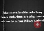 Image German military aider des réfugiés en provenance de zones de lourds bombardements Français Front Ouest, 1915, de la seconde 7 séquences d'archives historiques vidéo 65675045933