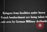 Image German military aider des réfugiés en provenance de zones de lourds bombardements Français Front Ouest, 1915, de la seconde 16 séquences d'archives historiques vidéo 65675045933