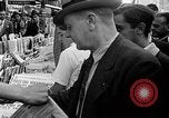 Image of American civilians getting war news in 1939 New York City USA, 1939, second 17 stock footage video 65675046128