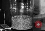 Image of Capsules in glass container United States USA, 1940, second 41 stock footage video 65675046219