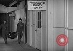 Image of Processing reconnaissance film United States USA, 1940, second 60 stock footage video 65675046336