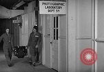 Image of Processing reconnaissance film United States USA, 1940, second 61 stock footage video 65675046336
