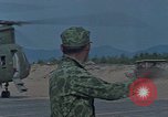 Standbild F-4 Phantom II bewaffnet und CH-46 Helikopter geladen während der Schlacht Vietnam, 1967, aus Sekunde 58 historischem Filmmaterial Videoclip 65675046345