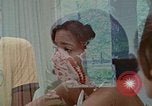 Image of female students and navy United States USA, 1975, second 1 stock footage video 65675046351