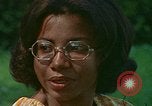 Image of female students and navy United States USA, 1975, second 36 stock footage video 65675046351