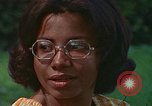 Image of female students and navy United States USA, 1975, second 41 stock footage video 65675046351
