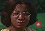 Image of female students and navy United States USA, 1975, second 46 stock footage video 65675046351