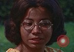 Image of female students and navy United States USA, 1975, second 52 stock footage video 65675046351