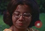 Image of female students and navy United States USA, 1975, second 56 stock footage video 65675046351