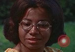 Image of female students and navy United States USA, 1975, second 57 stock footage video 65675046351